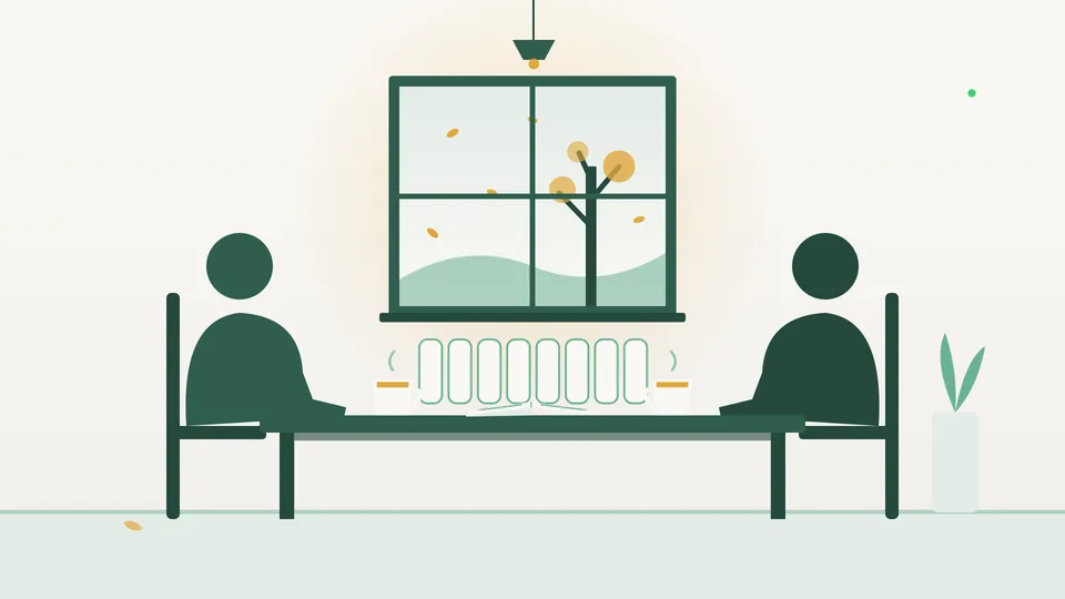 Flat autumn kitchen scene showing the silhouettes of a landlord and a tenant sitting across a table with two cups of tea and an open notebook, with a radiator and a window of falling autumn leaves behind them.